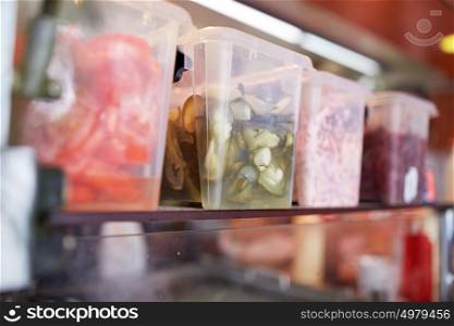 sale and food concept - containers with food at grocery store or restaurant kitchen. containers with food at restaurant kitchen