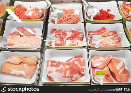 sale and food concept - meat in bowls at grocery stall. meat in bowls at grocery stall. meat in bowls at grocery stall
