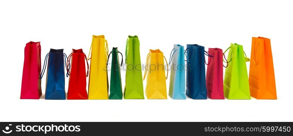 sale, consumerism, advertisement and retail concept - many colorful shopping bags