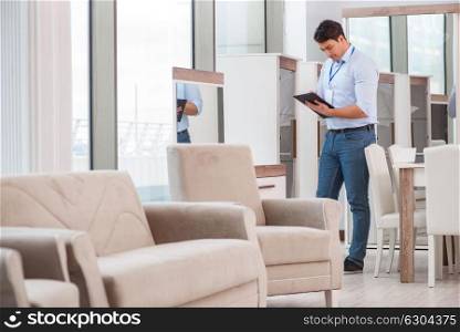 Sales assistant in furniture store