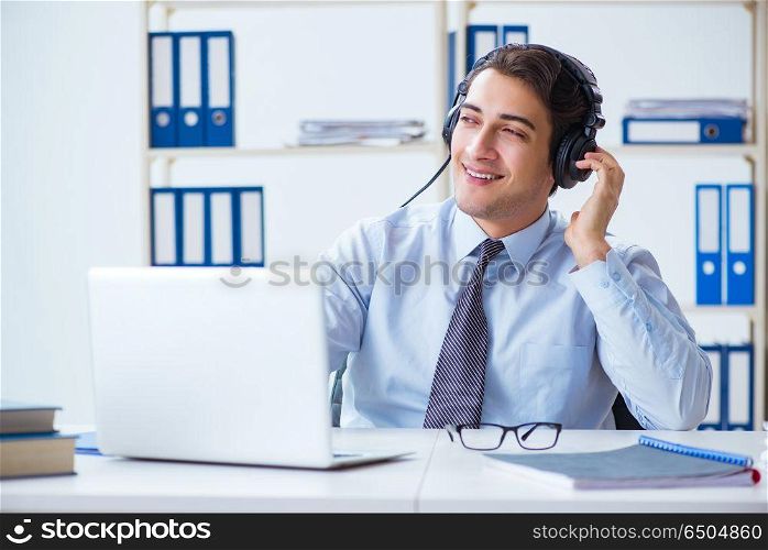 Sales assistant listening to music during lunch break