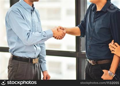 Sales man shake hands to customer successful to sale home