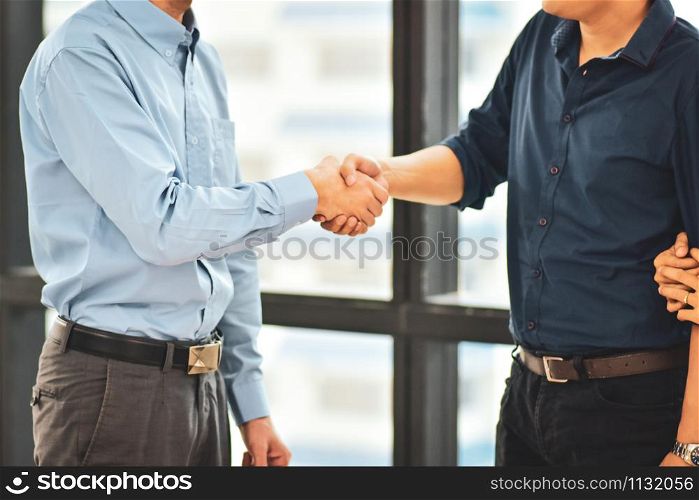 Sales man shake hands to customer successful to sale home