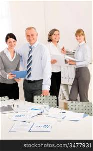 Sales meeting business people review reports consulting new strategy
