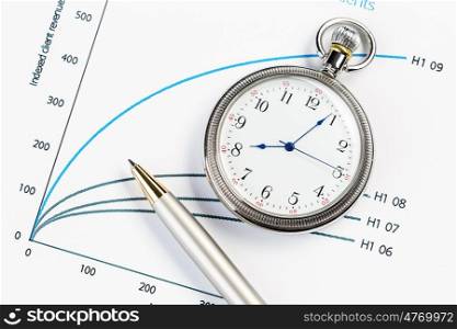 Sales report. Pocket watch and transparent rulers symbolizing traditional business