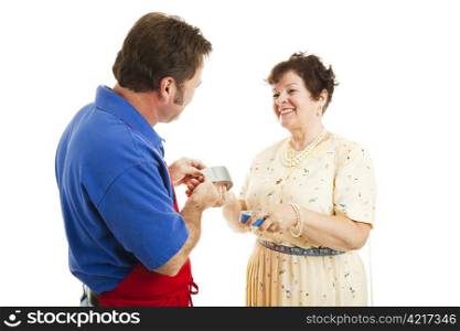 Salesman in a hardware store advises a woman on which tape is right for the job. Isolated on white.