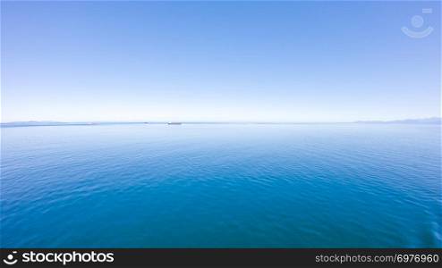 salish sea view of the shoreline of the north west coast of Vacouver taken from the ocean, British Columbia, Canada