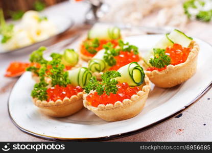 salmon caviar . salmon caviar with butter, caviar and tartalets, stock photo