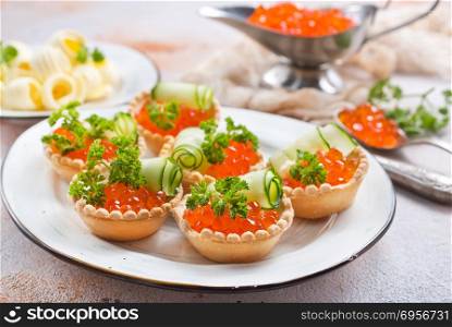 salmon caviar . salmon caviar with butter, caviar and tartalets, stock photo