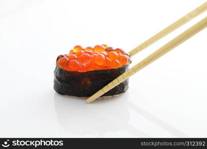 Salmon egg on sushi nigiri roll