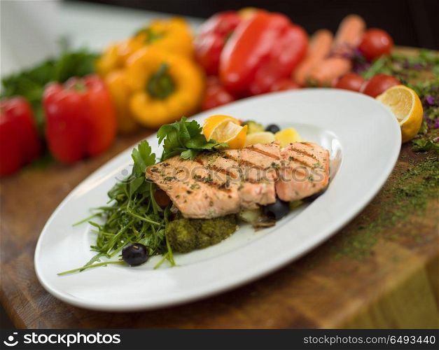 Salmon fillet steak in white plate Healthy food style. Salmon fillet steak