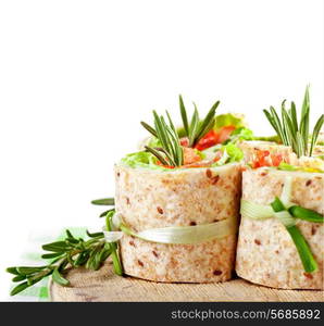 Salmon lavash rolls with fresh salad leafs