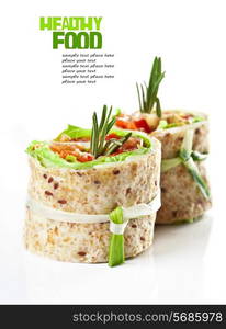 Salmon lavash rolls with fresh salad leafs