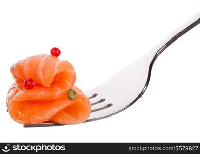 Salmon piece on fork isolated on white background cutout