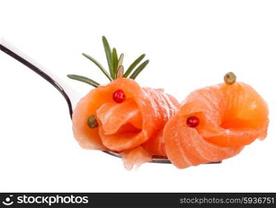 Salmon piece on fork isolated on white background cutout