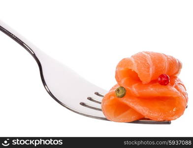 Salmon piece on fork isolated on white background cutout