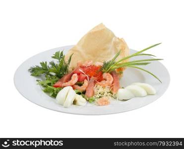 Salmon salad, shrimp and red caviar on an isolated background