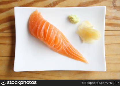 Salmon Sushi on wood background
