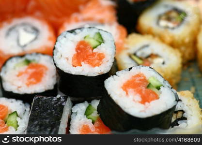 salmon sushi rolles close up low angel shot