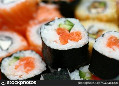 salmon sushi rolles close up low angel shot
