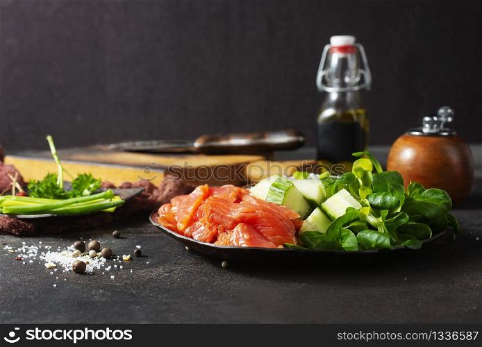 salmon with bread and creamcheese on plate