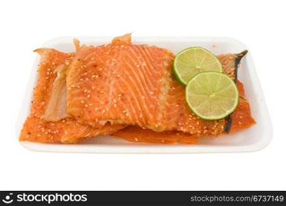 salmon with green lemon. isolated on white background.