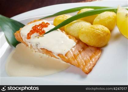 Salmon with potato .cream sauce.Shallow depth-of-field