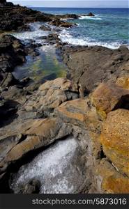 salt in lanzarote isle foam rock spain landscape stone sky cloud beach water &#xA;