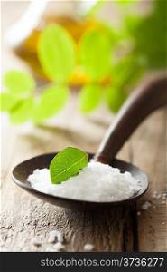 salt in wooden spoon for spa