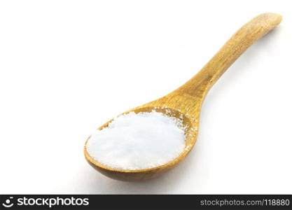 salt in wooden spoon on white background