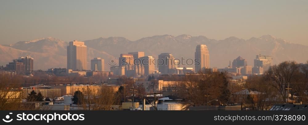 Salt Lake City with the Wasatch Mountain Range showing through the pollution
