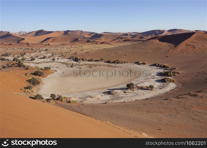 Salt pan near Sossusvlei in the Namib Desert, Namibia, Africa.