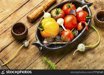 Salted homemade tomato.Cooking process.Canned tomato.Marinated vegetable.Preparation for pickling tomato. Raw tomato,preservation of tomatoes