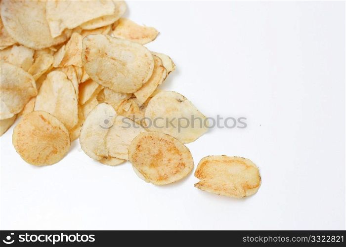 Salty potato chips isolated on white