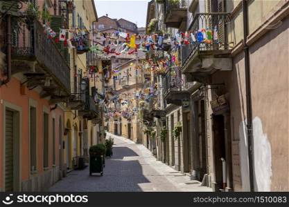 Saluzzo, Cuneo, Piedmont, Italy: historic buildings along an old typical street