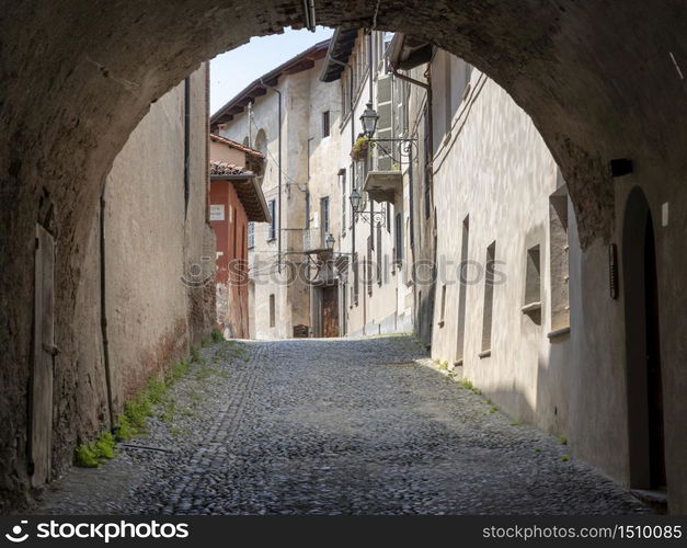 Saluzzo, Cuneo, Piedmont, Italy: historic buildings along an old typical street