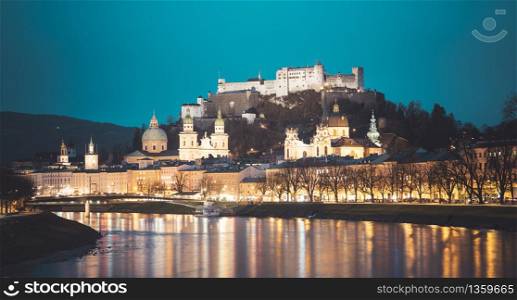 Salzburg old city, fortress, cathedral and salzach on dusk, twilight hour