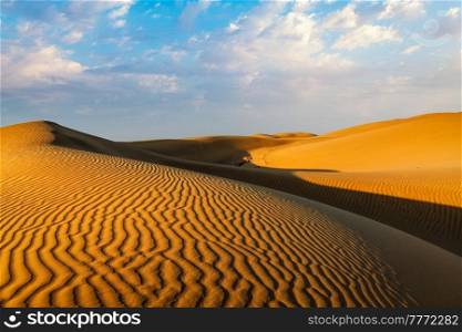 Sam Sand dunes of Thar Desert under beautiful sky on sunset. Rajasthan, India. Sand dunes in desert