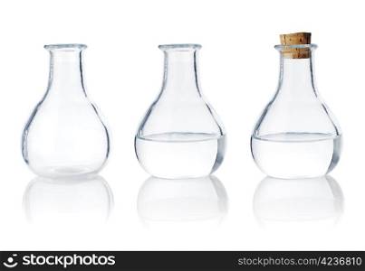 Same old fashioned glass bottle in three different stages.