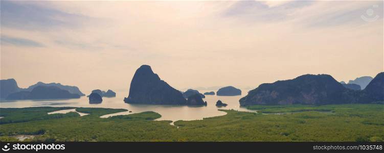 Samet Nangshe Viewpoint at sunset with Andaman sea in Phang Nga Bay, tourist attraction in summer season, Thailand in travel trip and holidays vacation. Natural landscape wallpaper background.