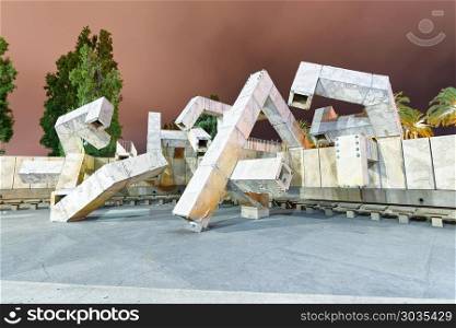 SAN FRANCISCO, AUGUST 5, 2017: Modern sculpture at night on the . SAN FRANCISCO, AUGUST 5, 2017: Modern sculpture at night on the plaza in front of Ferry Building. The water sculpture is currently dry