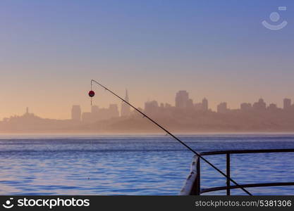 San francisco fog skyline with fishing rod in the mist California USA