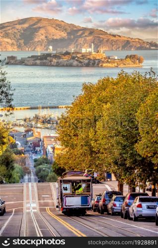 San Francisco, skyline with cable car and Alcatraz Island in USA