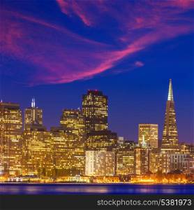 San Francisco sunset skyline in California with reflection in bay water USA