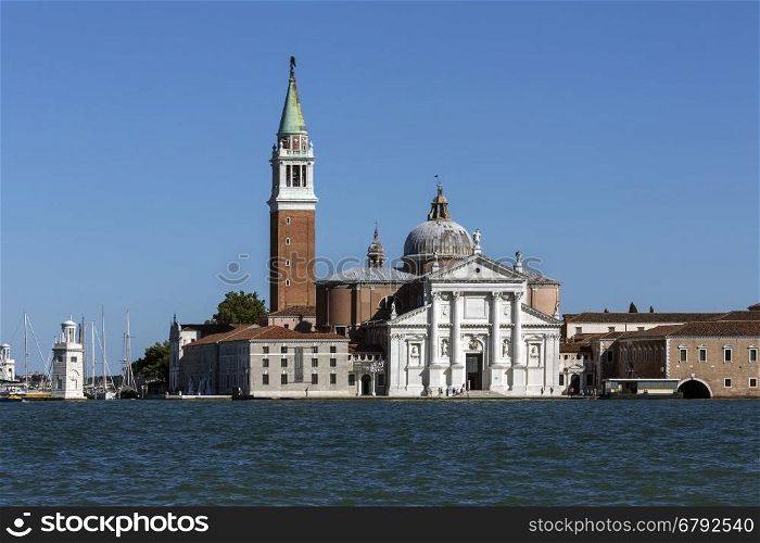 San Giorgio Maggiore Island in the Canale della Grazia in Venice in northern Italy. San Giorgio Maggiore is a 16th-century Benedictine church, designed by Andrea Palladio, and built between 1566 and 1610. The first church on the island was built about 790, and in 982, the island was given to the Benedictine order by the Doge Tribuno Memmo. The Benedictines founded a monastery there, but in 1223, all the buildings on the island were destroyed by an earthquake