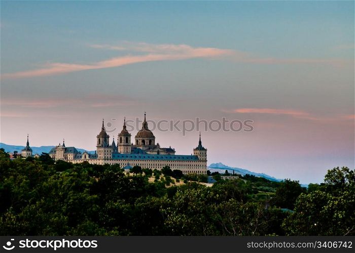 San Lorenzo de El Escorial Monastery from a distance with beautiful sky right after sunset.