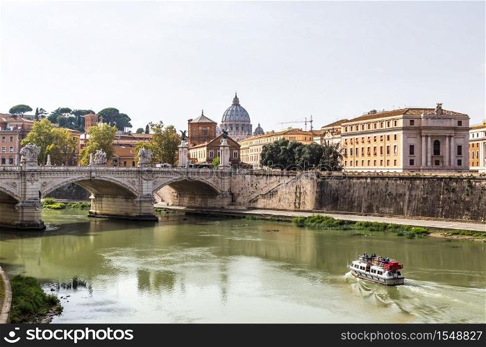 San Pietro basilica and Sant angelo bridge in a summer day in Rome, Italy