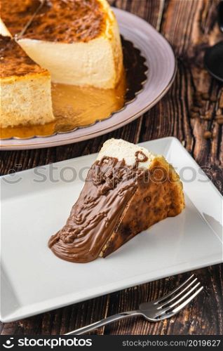 San Sebastian Cheesecake with Chocolate Poured on it