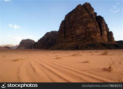 sand and mount Seven Pillars in Wadi Rum, Jordan