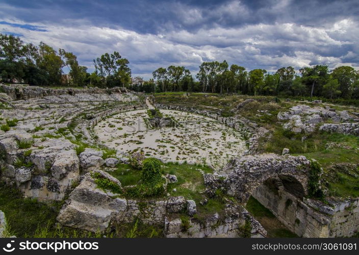 Sand and steps of the historical roman circus of syracuse sicily italy